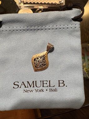Samuel B. Light Blue Suede Drawstring Pouch with Embossed Silver Pendant